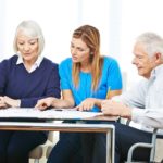 elderly couple looking at options